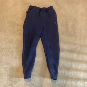 Small blue Nike sweatpants.